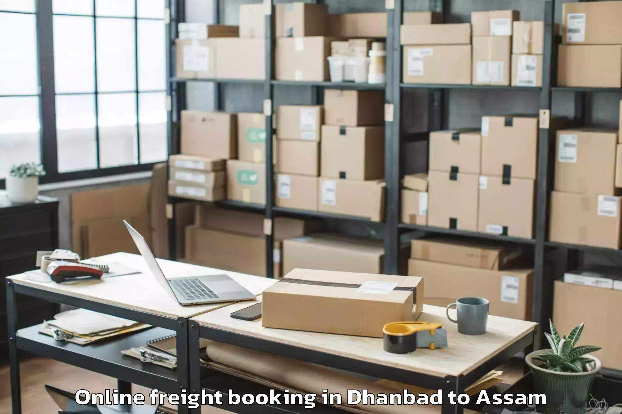 Trusted Dhanbad to Nagaon Online Freight Booking